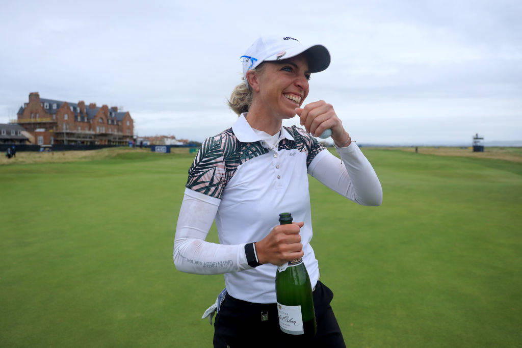 Sophia Popov celebrating with Champagne after winning the AIG Women